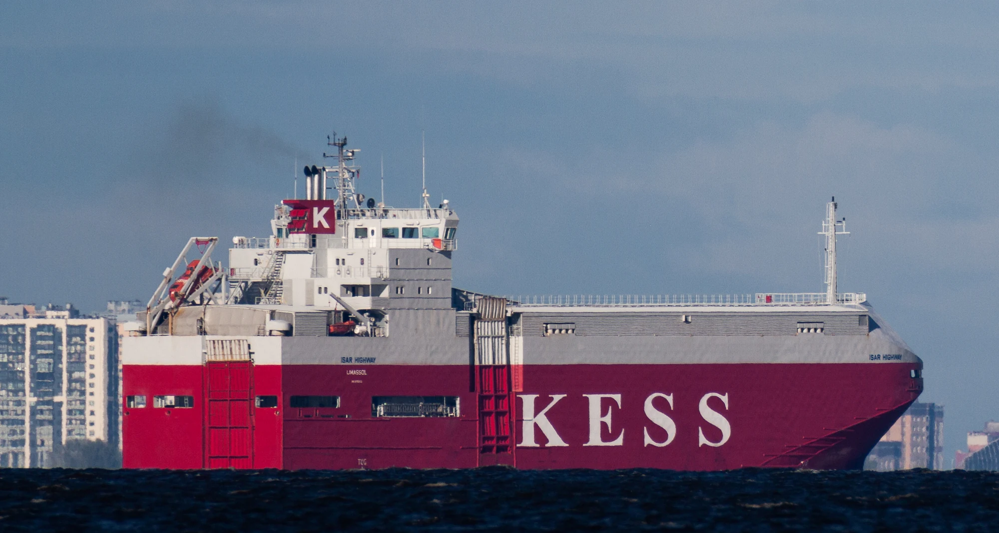Cargo vessel photographed across 10 kilometres of water